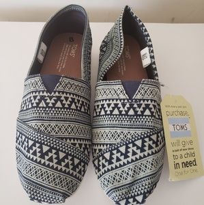 Blue and white TOMS slip-ons size 8